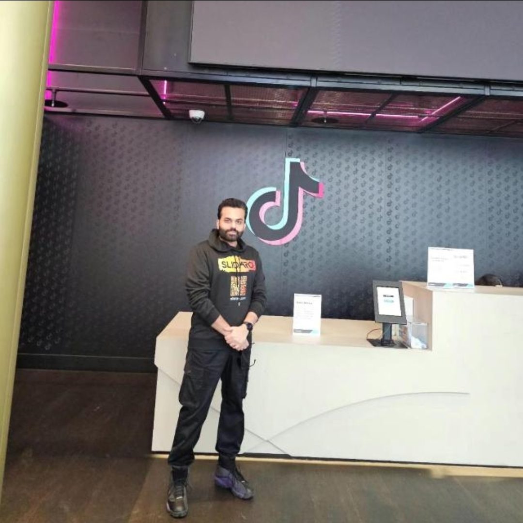TokAxis founder standing at TikTok UK Headquarters reception — invited as New Emerging Brand